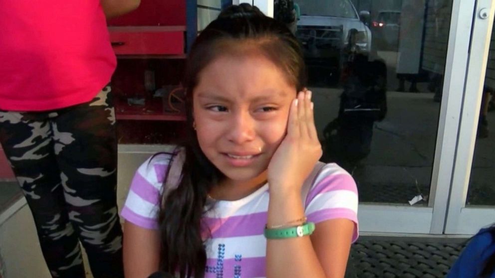 PHOTO: Magdalena Gomez Gregorio, 11, cries while talking to reporters about her father, who was arrested by ICE agents during a raid in Mississippi on Aug. 7, 2019.