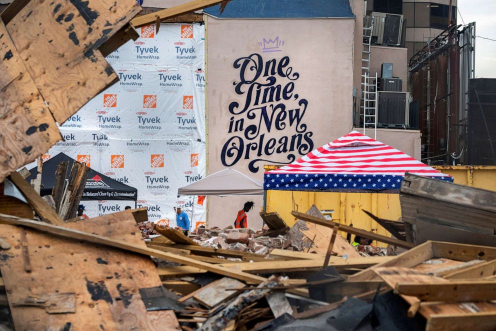 PHOTO: Workers clean up the site of the historic Karnofsky Shop, which collapsed during Hurricane Ida in New Orleans, Sept. 6, 2021.