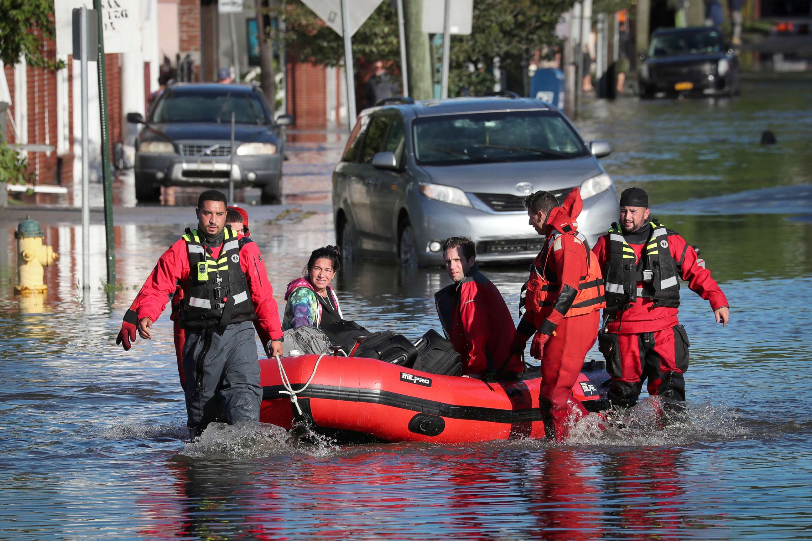 PHOTO: First responders pull local residents in a boat as they rescues people trapped by floodwaters after the remnants of Tropical Storm Ida affected parts of the northeast in Mamaroneck, New York, Sept. 2, 2021. 