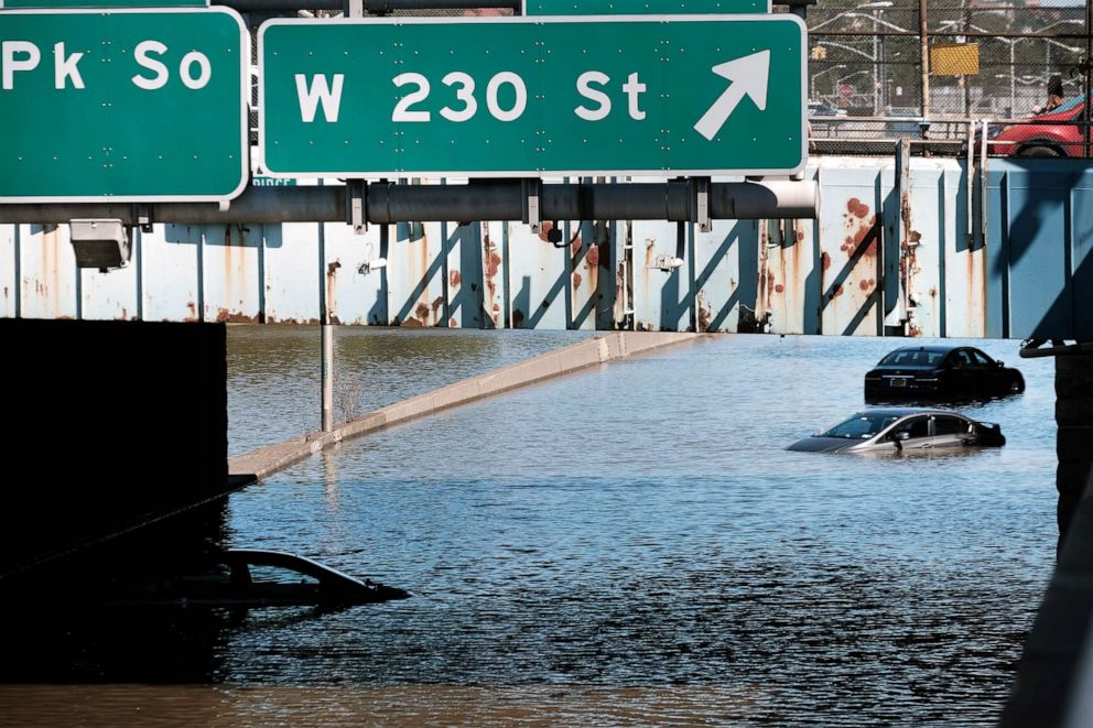 PHOTO: Cars sit abandoned on a flooded highway following a night of extremely heavy rain from the remnants of Hurricane Ida on Sept. 2, 2021 in the Bronx borough of New York City. 