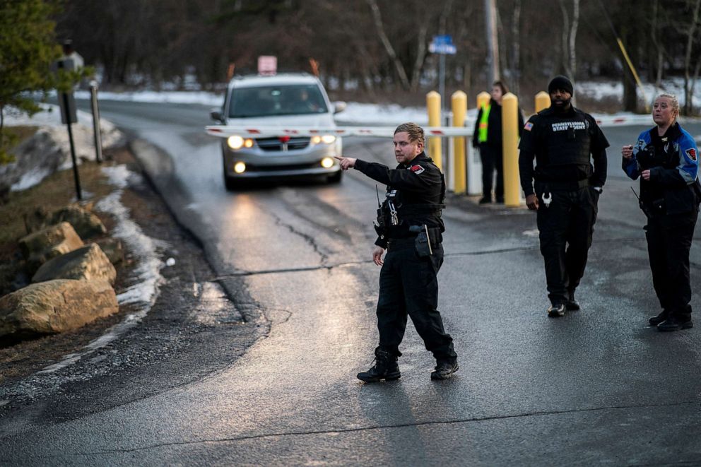 PHOTO: Security and police stand guard at the entrance of a private community after Pennsylvania State Police arrested Bryan Kohberger, a suspect wanted in the killings of four University of Idaho students, in Albrightsville, Pa., Dec. 30, 2022.