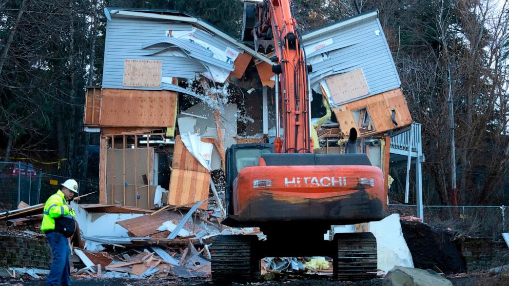 PHOTO: Heavy equipment is used to demolish the house where four University of Idaho students were killed in 2022 on Thursday, Dec. 28, 2023, in Moscow, Idaho.