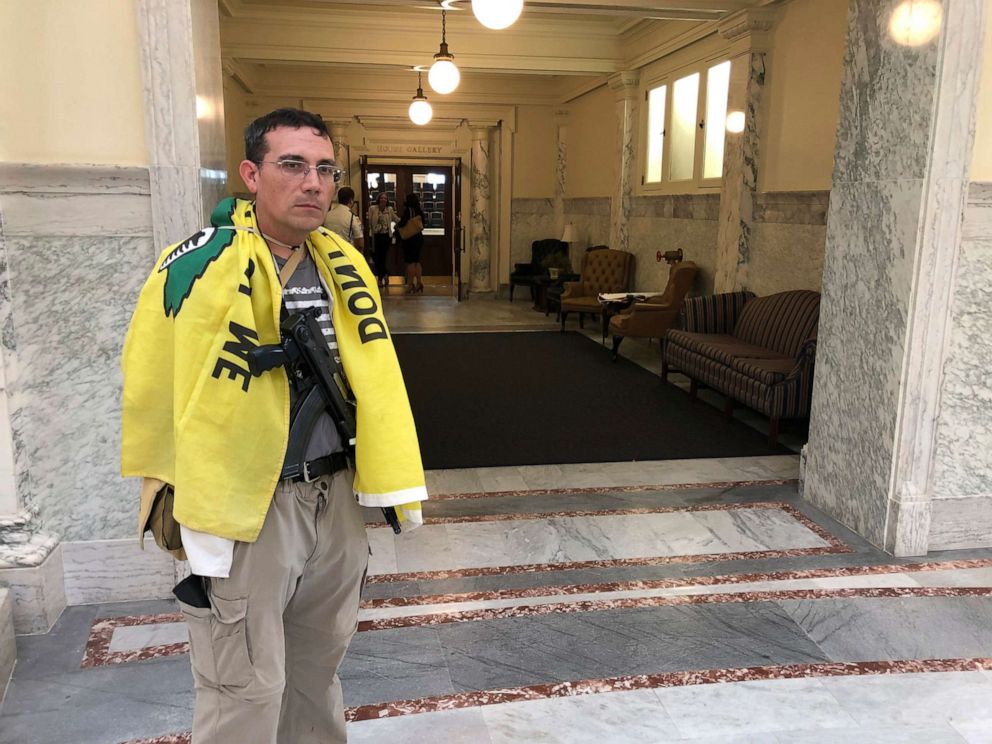 PHOTO: Allen Clark of Meridian, Idaho, attends the opening of the Idaho special session at the Statehouse in Boise, Idaho, on Monday, Aug. 24, 2020.