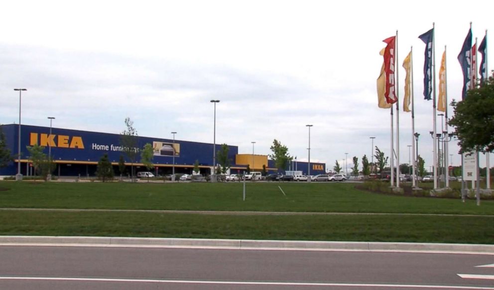 PHOTO: Cars are parked outside an IKEA store in Fishers, Ind., where a boy fired a loaded gun that he found in a couch on June 25, 2018.