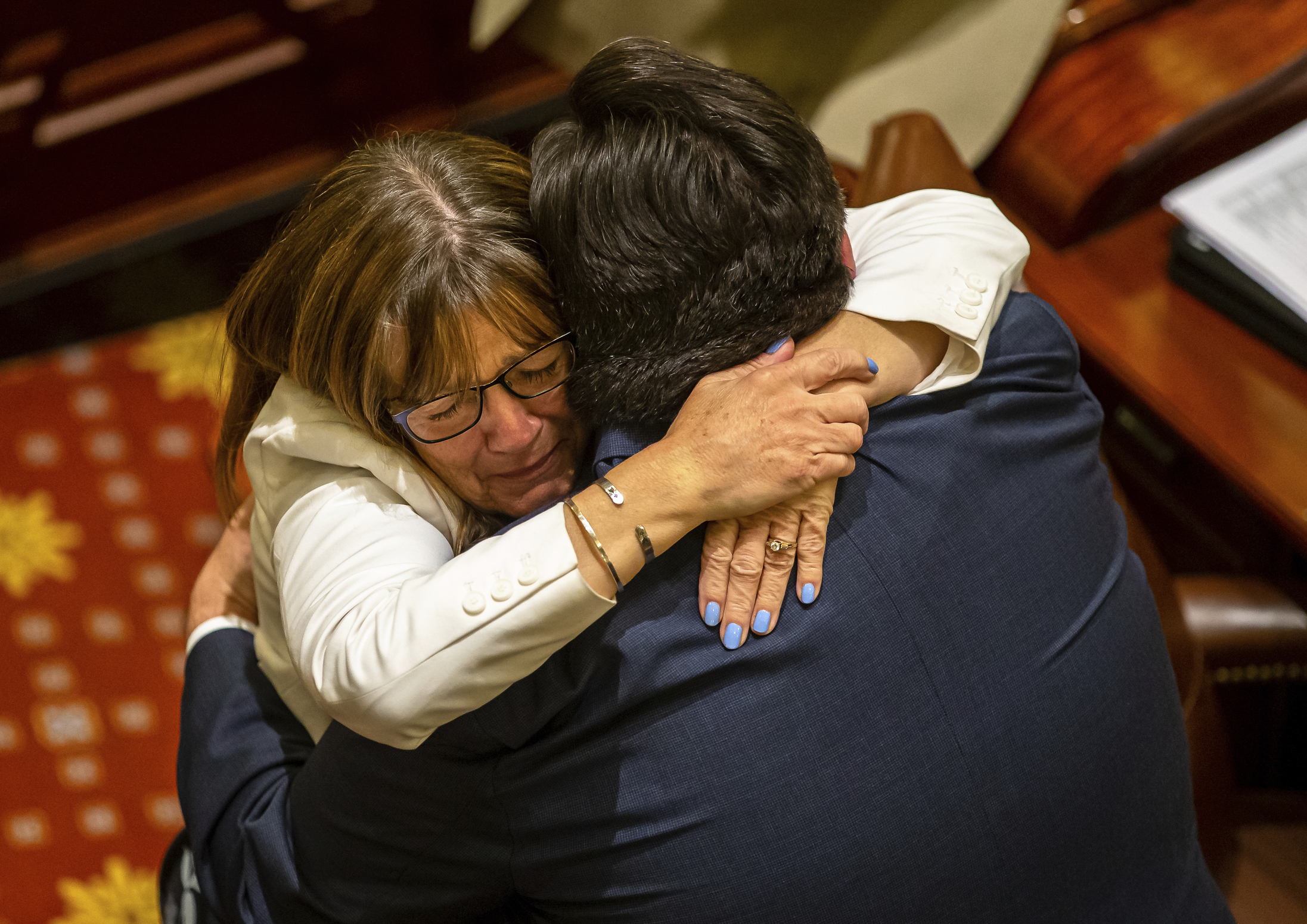 PHOTO: Gov. J.B. Pritzker hugs state Sen. Melinda Bush as they celebrate the Illinois Senate passage of the Reproductive Health Act, late Friday, May 31, 2019, in Springfield, Ill.