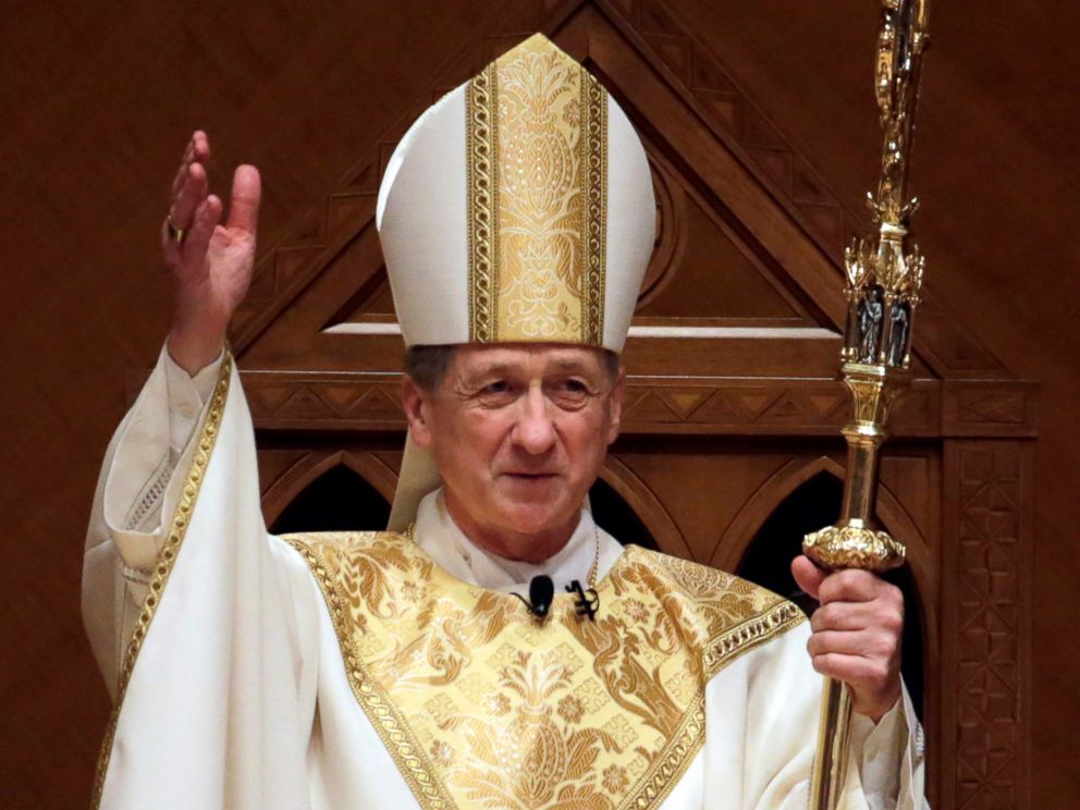 PHOTO: Archbishop Blase Cupich acknowledges after the retiring Cardinal Francis George presents the crozier the during his Installation Mass at Holy Name Cathedral in Chicago, Nov. 18, 2014.