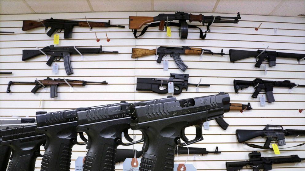 PHOTO: Assault weapons and hand guns are seen for sale at Capitol City Arms Supply on Jan. 16, 2013, in Springfield, Ill.