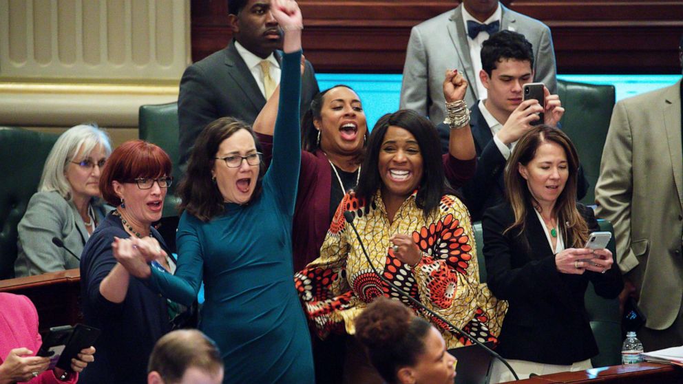 PHOTO: Illinois lawmakers celebrate after Illinois House approved a bill to legalize recreational marijuana at the State Capitol in Springfield, Ill., on  May 31, 2019.
