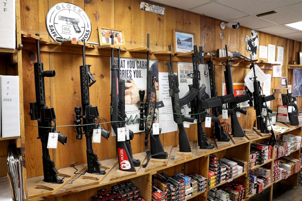PHOTO: Assault-style rifles now banned for sale in the state are displayed at Freddie Bear Sports on Jan. 11, 2023, in Tinley Park, Illinois.