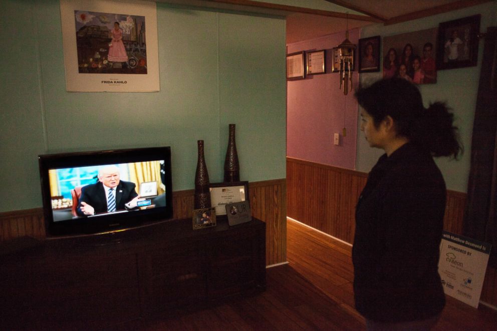 PHOTO: Alvarez watches Preisdent Donald Trump on TV.