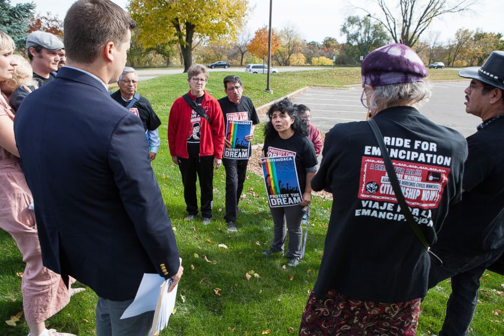 PHOTO: Antonia faces off with a staff member from Erik Paulsen's office, detailing her issues with the congressman, after Asamblea members were locked out during an attempted sit-in protest.