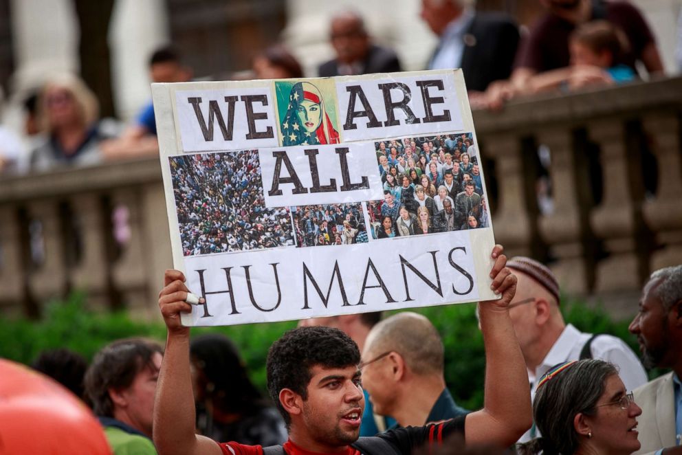 PHOTO: Activists rally to support immigrants and to mark World Refugee Day, June 20, 2018 in Midtown Manhattan in New York City.