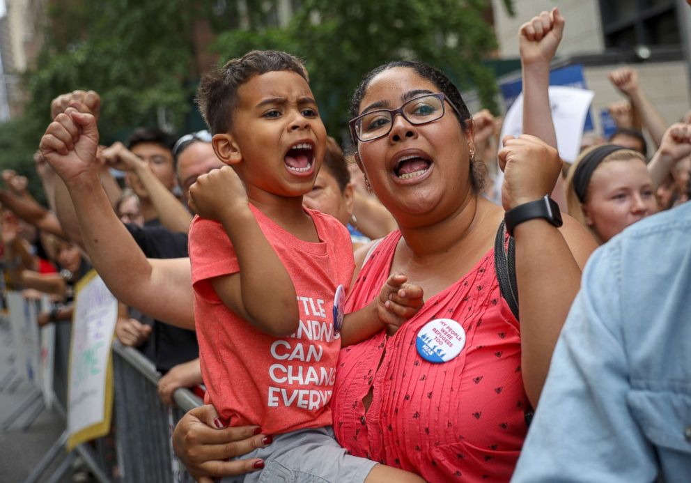 PHOTO: Activists rally in support immigrants and to mark World Refugee Day, June 20, 2018, near the United Nations in New York City.
