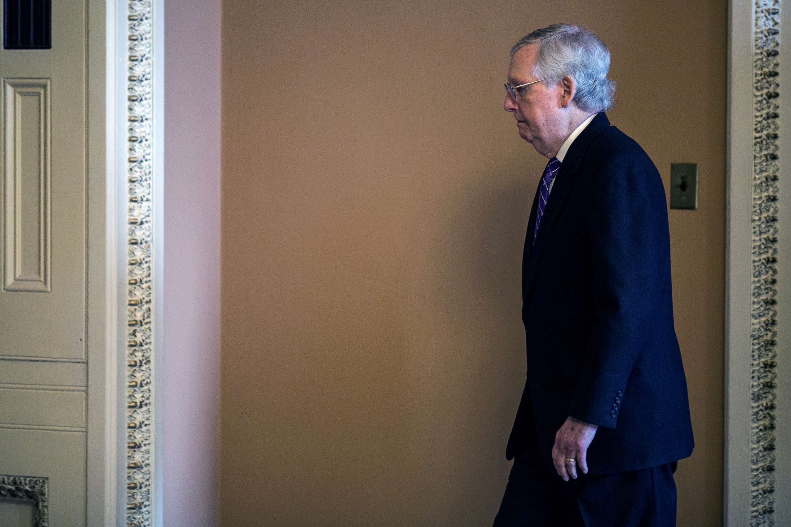 PHOTO: Senate Majority Leader Mitch McConnell walks through the Capitol during the Senate impeachment trial of President Donald Trump, Jan. 29, 2020 in Washington, D.C.