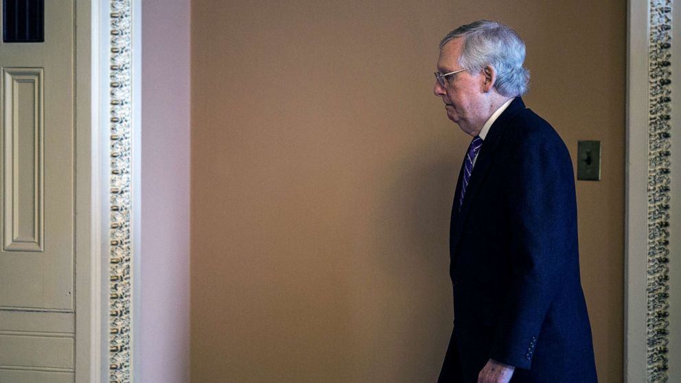 PHOTO: Senate Majority Leader Mitch McConnell walks through the Capitol during the Senate impeachment trial of President Donald Trump, Jan. 29, 2020 in Washington, D.C.