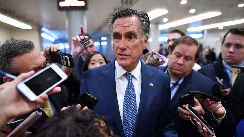 PHOTO: Senator Mitt Romney speaks to the media as he arrives during the impeachment trial of US President Donald Trump on Capitol Hill Jan. 29, 2020, in Washington, D.C.
