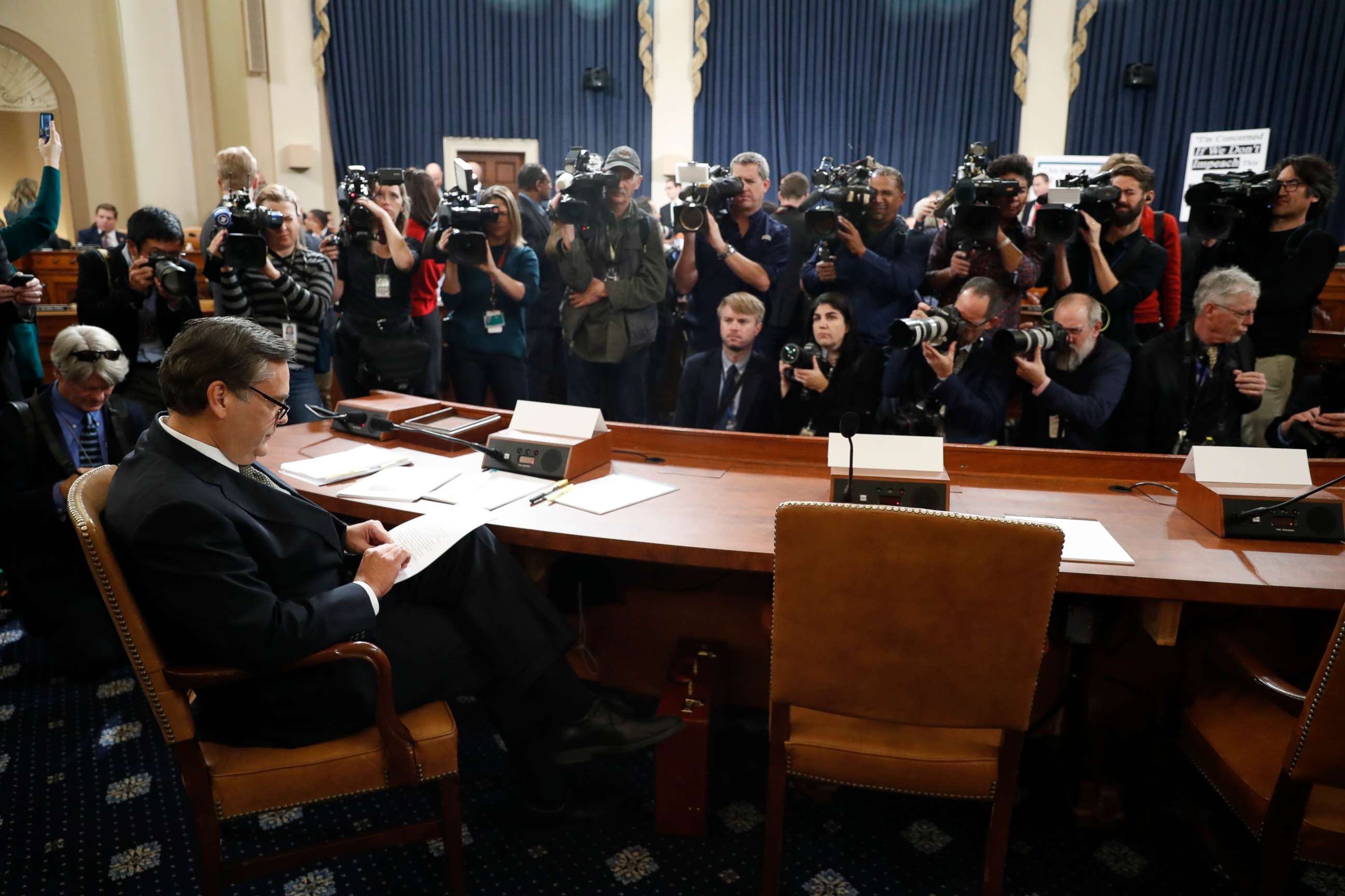 PHOTO: George Washington University Law School professor Jonathan Turley is seated before testifying at a hearing before the House Judiciary Committee on Capitol Hill in Washington, Dec. 4, 2019.