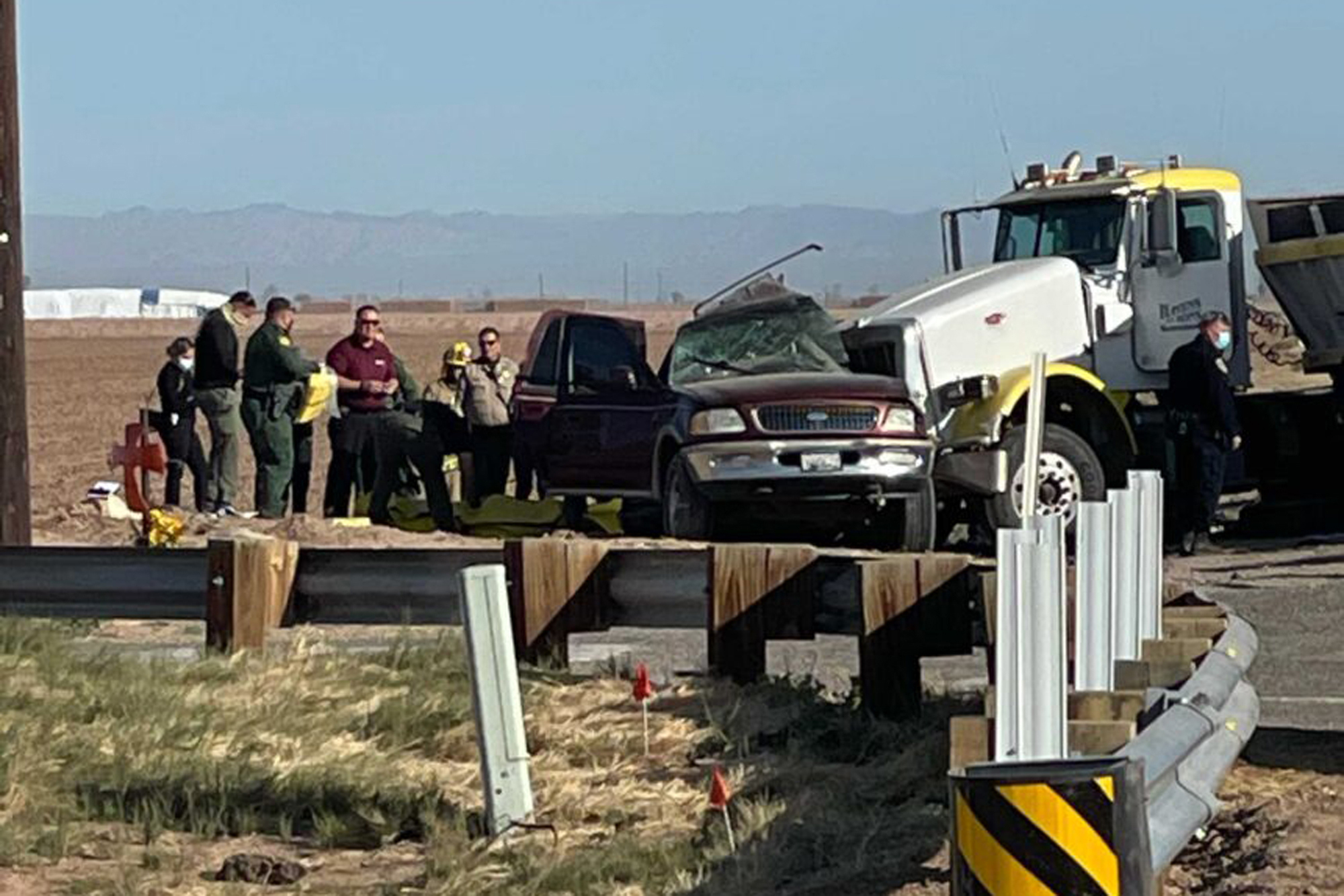 PHOTO: In this image from KYMA, law enforcement work at the scene of a deadly crash involving a semi-truck and an SUV in Holtville, Calif., March 2, 2021.