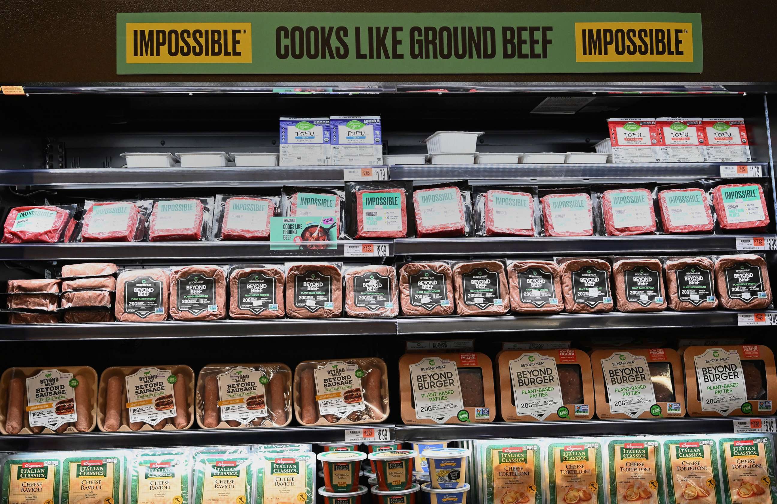 PHOTO: PPackages of "Impossible Foods" burgers and Beyond Meat made from plant-based substitutes for meat products for sale on Nov. 15, 2019 in New York City.