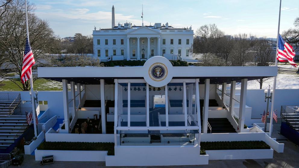 PHOTO: Workers continue with the finishing touches on the presidential reviewing stand on Pennsylvania outside the White House, Jan. 16, 2025, in Washington, ahead of President-elect Donald Trump's inauguration.