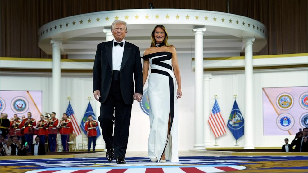 PHOTO: President Donald Trump and first lady Melania Trump arrive on stage to dance at the Commander in Chief Ball, part of the 60th Presidential Inauguration, Jan. 20, 2025, in Washington.