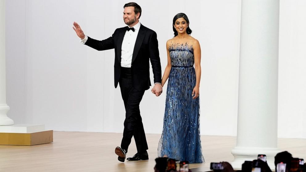 PHOTO: Vice President JD Vance, left, and his wife Usha Vance arrive at the Commander in Chief Ball, Jan. 20, 2025, in Washington. 