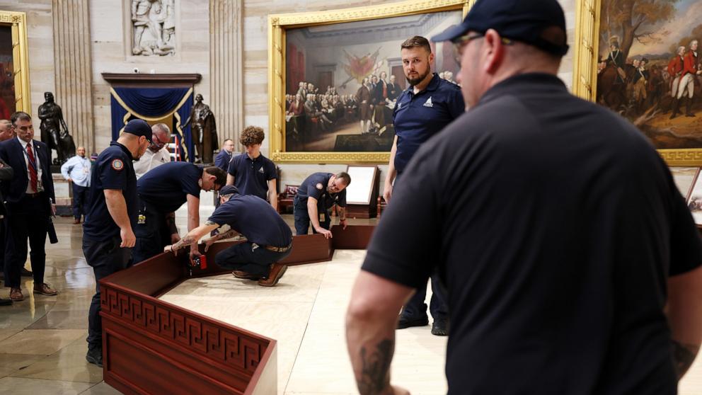 PHOTO: Workers prepare the stage in the U.S. Capitol rotunda for President-elect Donald Trump's 2nd term inauguration, Jan. 17, 2025, in Washington.