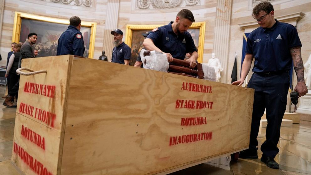 PHOTO: Workers build a stage in the U.S. Capitol Rotunda in Washington, Jan. 17, 2025, for the 60th Presidential Inauguration which was moved indoors because of cold temperatures.