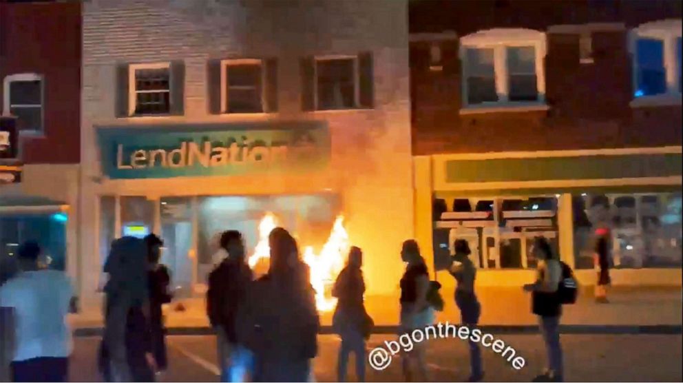 PHOTO: Smoke fills the streets as the crowd ran rampant through this business district,  in a video made by independent videographer Brendan Gutenschwager in Kenosha, Wisc., Aug. 25, 2020.