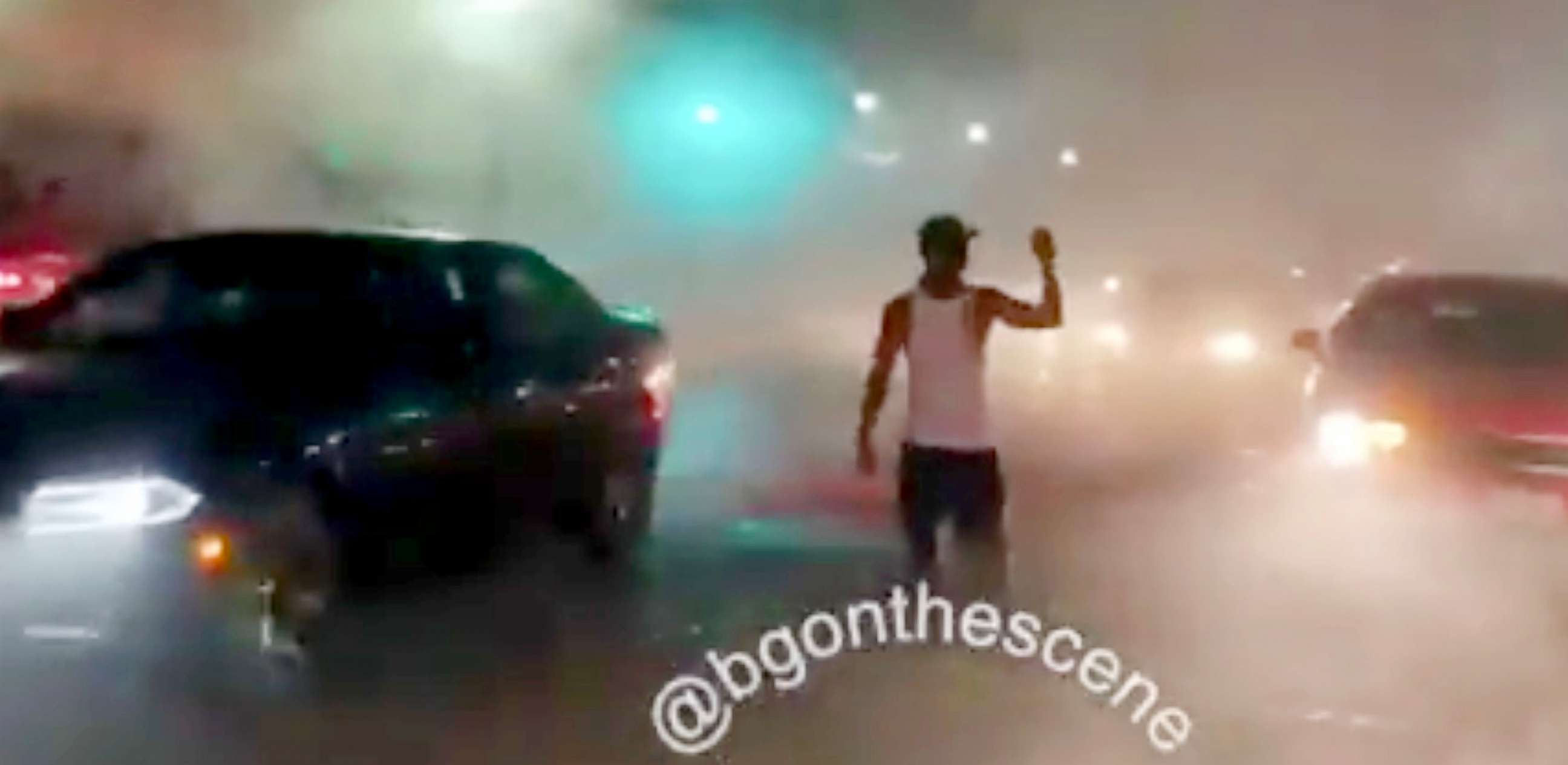 PHOTO: Smoke fills the streets as the crowd ran rampant through this business district,  in a video made by independent videographer Brendan Gutenschwager in Kenosha, Wisc., Aug. 25, 2020.