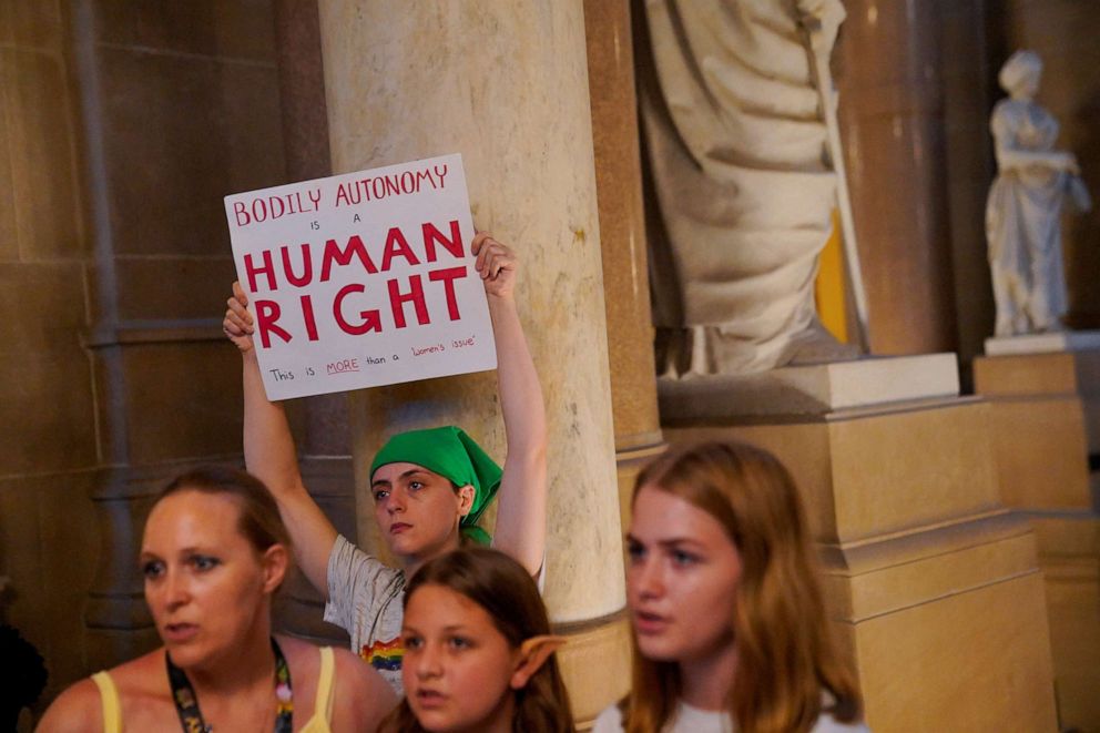 PHOTO: Demonstrators protest outside the Senate chambers before the vote to accept Senate Bill 1, which was passed by the House earlier, making the Indiana legislature the first in the nation to restrict abortions, in Indianapolis, Aug. 5, 2022.