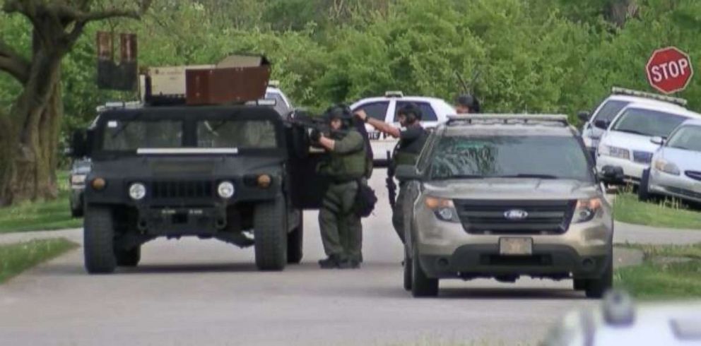 A standoff ensued following a police officer being shot and killed in Terre Haute, Ind., on Friday, May 4, 2018.