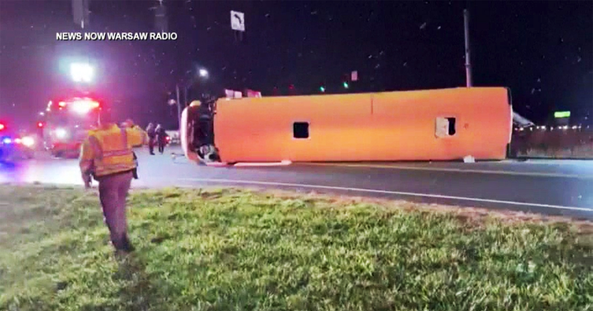 PHOTO: First responders investigate the scene of a overturned school bus in Warsaw, Ind., Nov. 12, 2022.