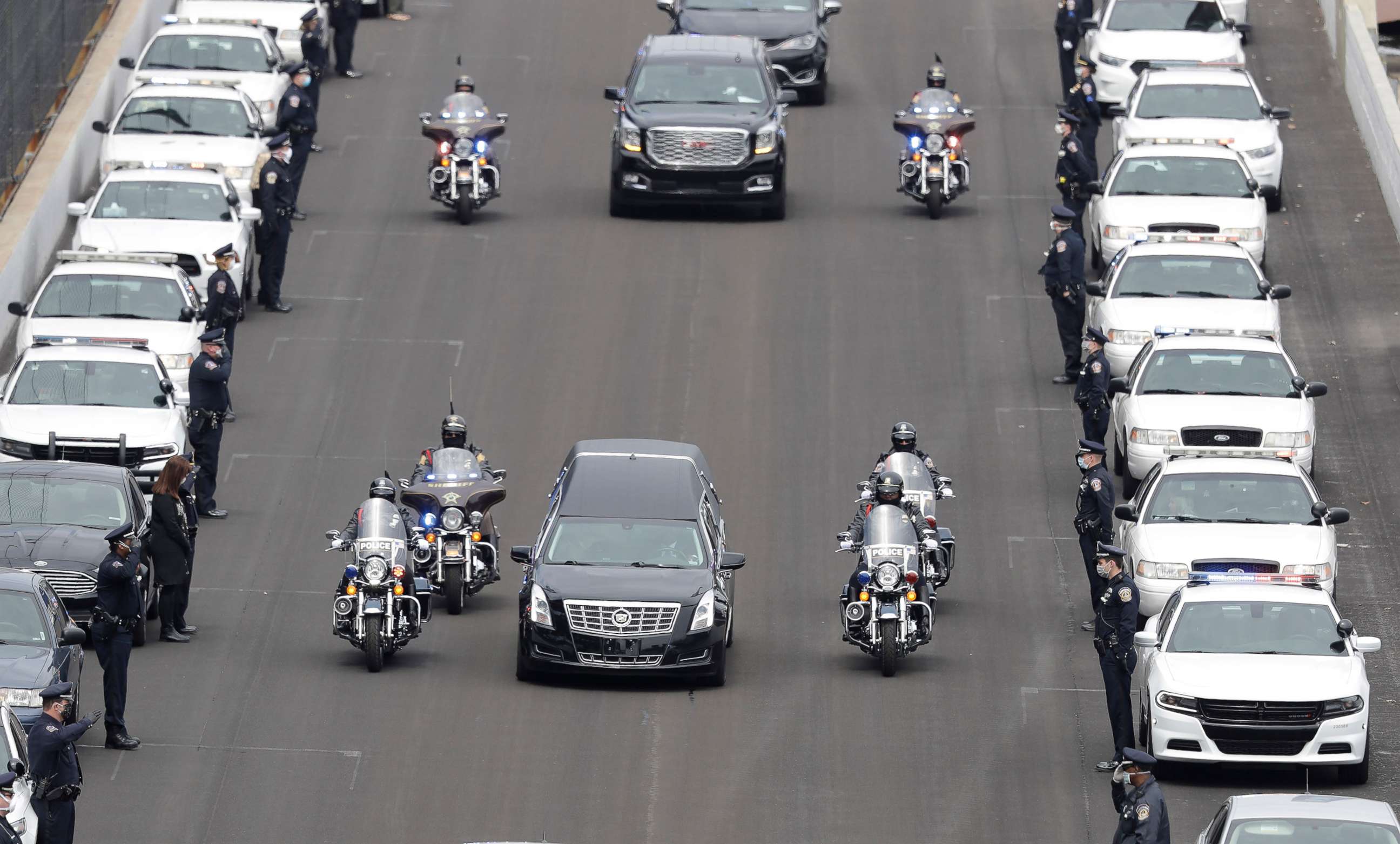 PHOTO: The hearse carrying the body of Indianapolis Metropolitan Police Department officer Breann "Bre" Leath makes it way down the main straightaway at the Indianapolis Motor Speedway following a funeral services, April 16, 2020, in Indianapolis.