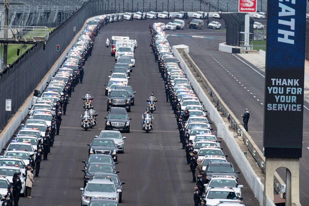 PHOTO: The hearse carrying the body of Indianapolis Metropolitan Police Department officer Breann "Bre" Leath makes it way down the main straightaway at the Indianapolis Motor Speedway following funeral services in Indianapolis, April 16, 2020. 