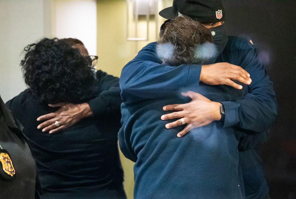 PHOTO:People hug after learning that their loved one is safe, April 16, 2021 in Indianapolis.
