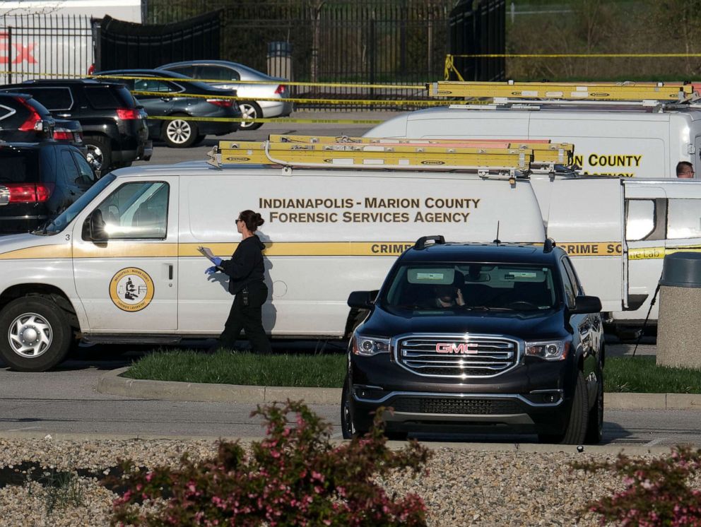 PHOTO: Marion County Forensic Services vehicles are parked at a FedEx facility in Indianapolis, April 16, 2021.