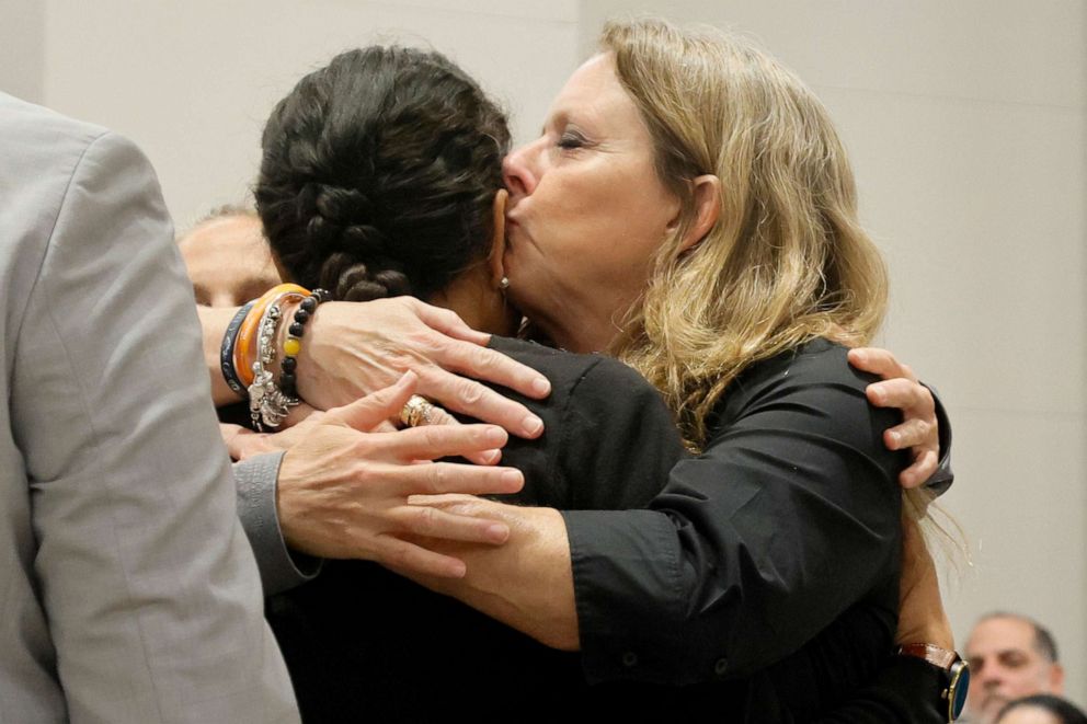PHOTO: Debbie Hixon, right, kisses her daughter-in-law, Ines Hixon, after she gave a victim impact statement in the sentencing hearing for Marjory Stoneman Douglas High School shooter Nikolas Cruz in Fort Lauderdale, Fla. on Nov. 1, 2022.