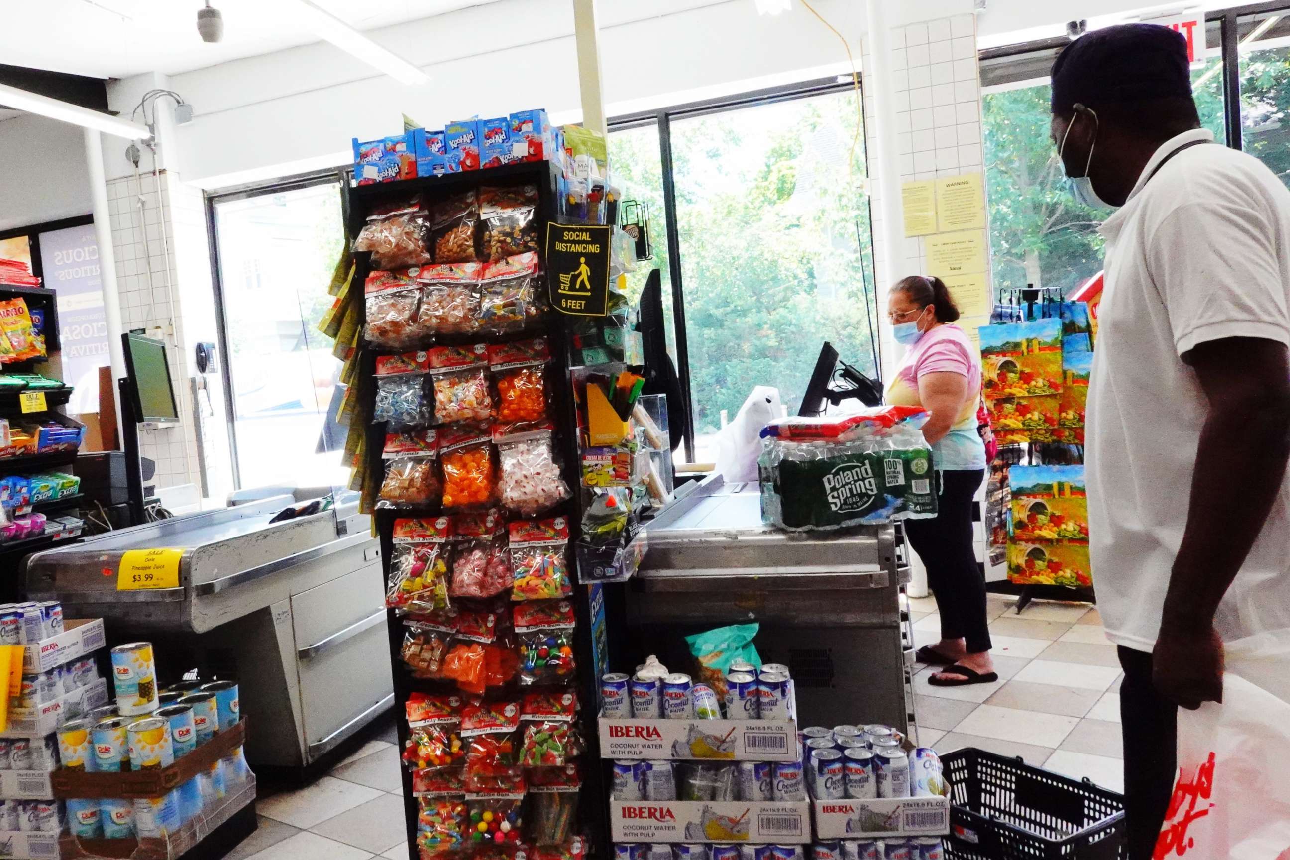 PHOTO: People prepare to check out their items at Ideal Fresh Market of Church Ave on June 10, 2022 in the Flatbush neighborhood of Brooklyn in New York City.