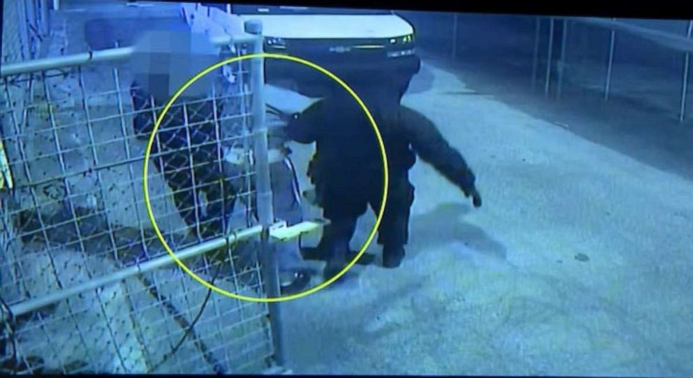 PHOTO: Footage from exterior cameras show the officers minutes later escorting the inmate, Ronald Gene Ingram, whose legs are dragging and head is slumped, into the transport van, prosecutors said.