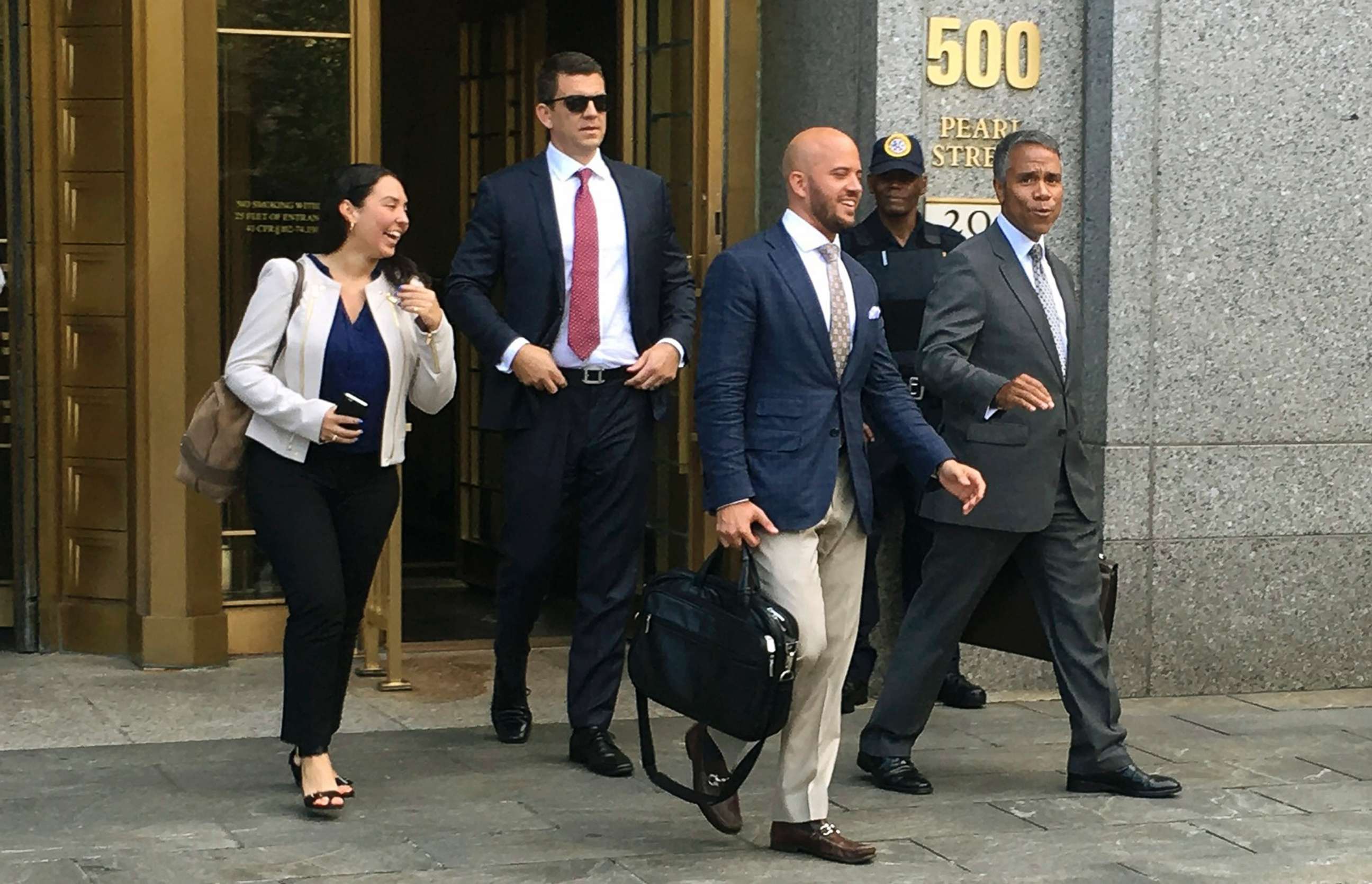 PHOTO: Insys Therapeutics Inc. employees and their lawyers walk out of federal court after they pleaded not guilty to engaged in a scheme to pay doctors kickbacks to prescribe a fentanyl-based drug the company sells, in New York, Aug, 17, 2016. 