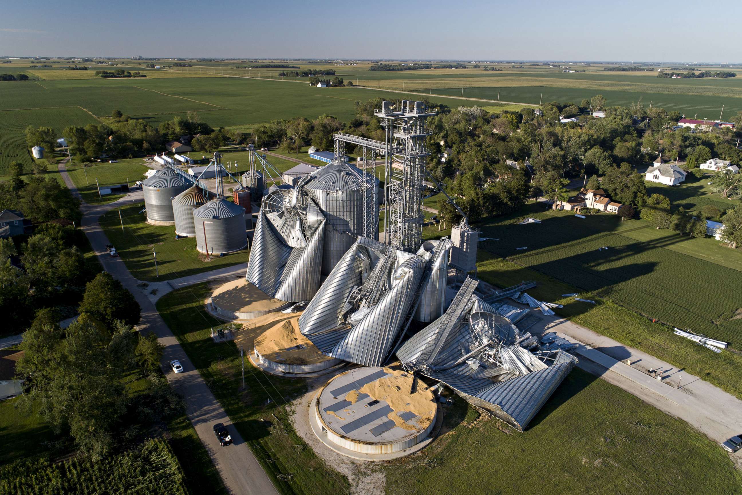PHOTO: In this aerial image from a drone, damaged grain bins are shown at the Heartland Co-Op grain elevator, Aug. 11, 2020, in Luther, Iowa. 