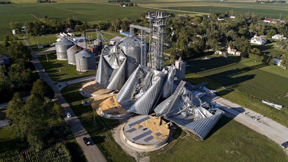 PHOTO: In this aerial image from a drone, damaged grain bins are shown at the Heartland Co-Op grain elevator, Aug. 11, 2020, in Luther, Iowa. 