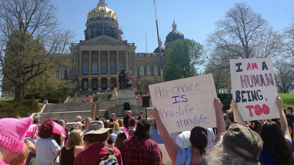 PHOTO: Planned Parenthood supporters rally outside the Iowa Capitol Building, May 4, 2018, in Des Moines, Iowa.