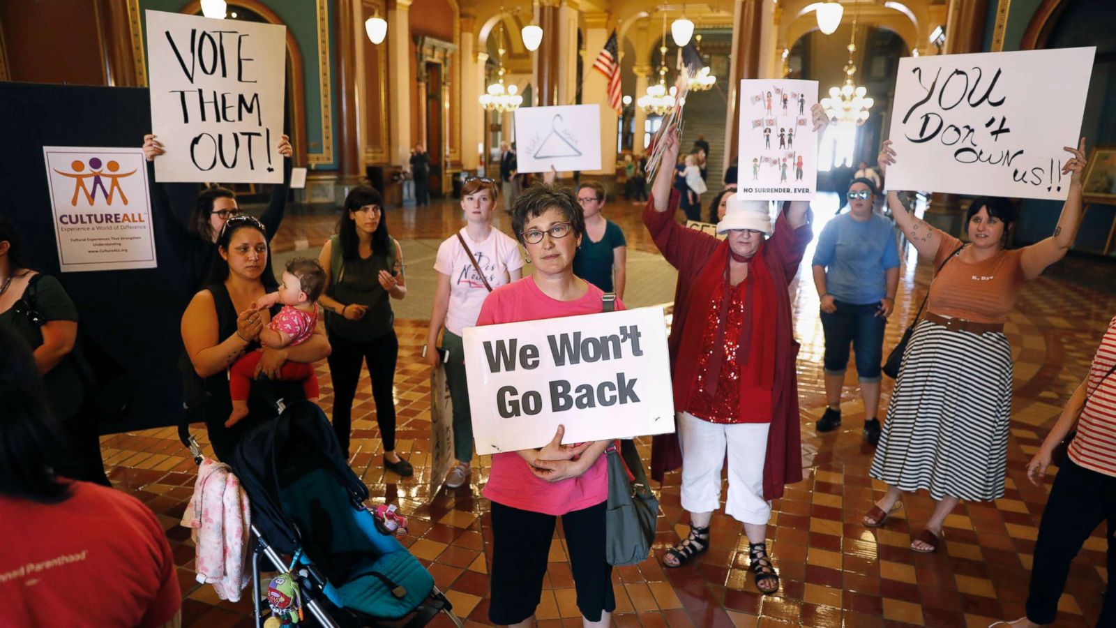 PHOTO: Protesters rally outside Iowa Gov. Kim Reynolds' formal office, May 4, 2018, at the Statehouse in Des Moines, Iowa, calling for her to veto a six-week abortion ban bill that would give the state the strictest abortion restrictions in the nation.