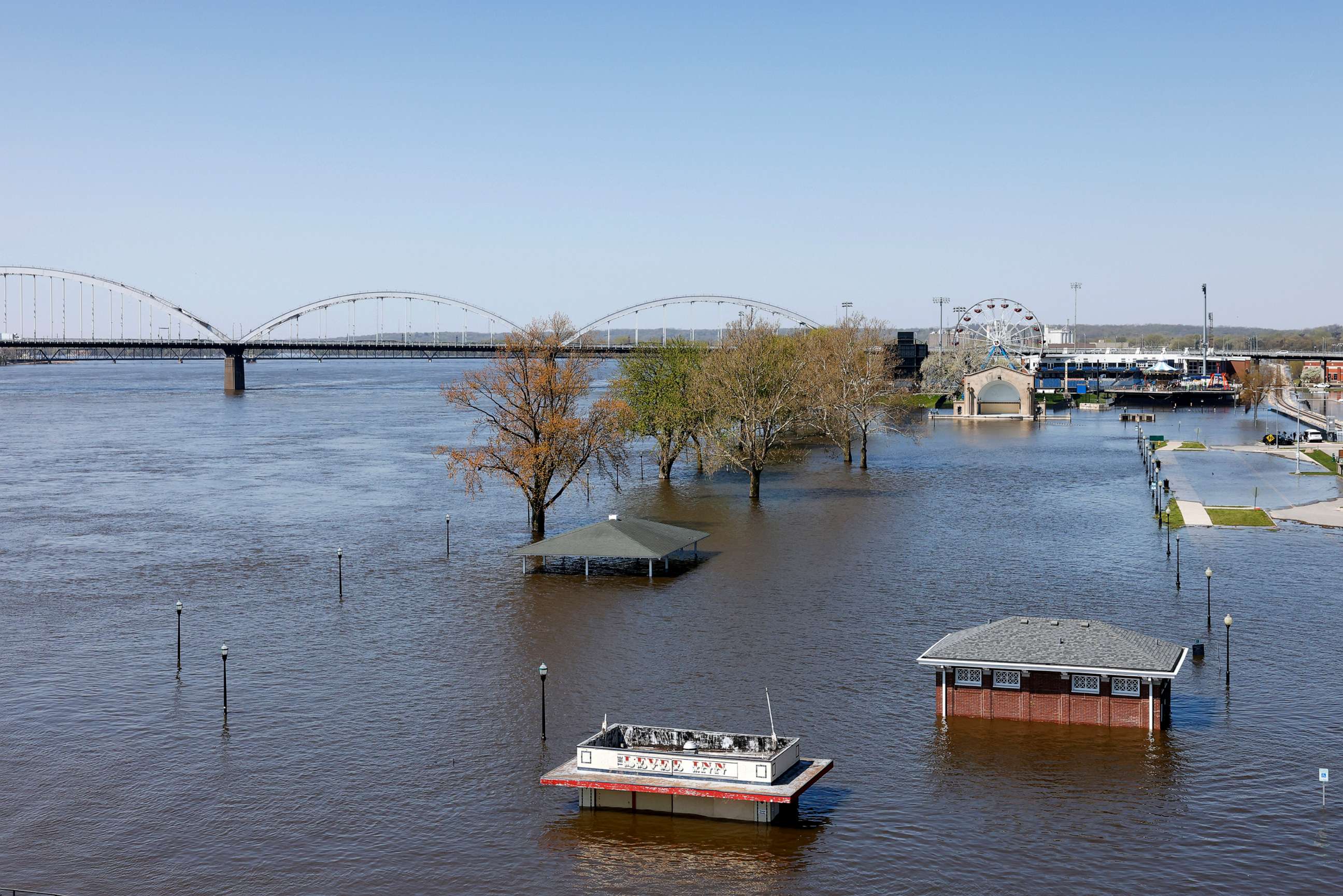 PHOTO: Floodwaters from the Mississippi River inundate LeClaire Park, April 27, 2023, in Davenport, Iowa.