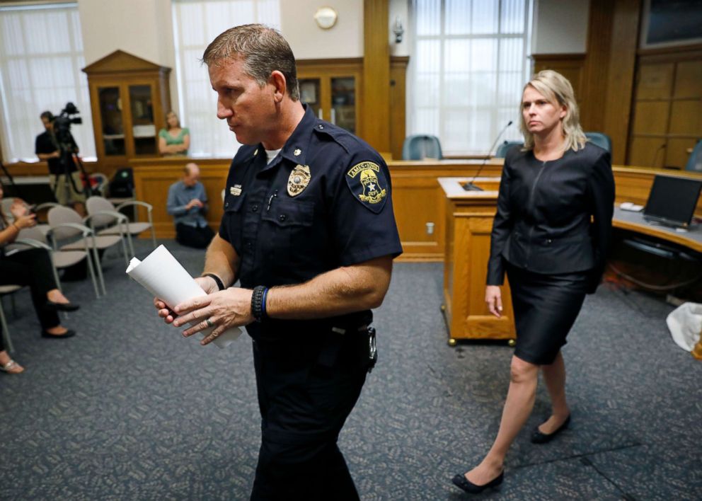 PHOTO: Ames Police Commander Geoff Huff and Story County Attorney Jessica A. Reynolds, right, leave a news conference after speaking about the death of Iowa State University student Celia Barquin Arozamena, Sept. 18, 2018, in Ames, Iowa.