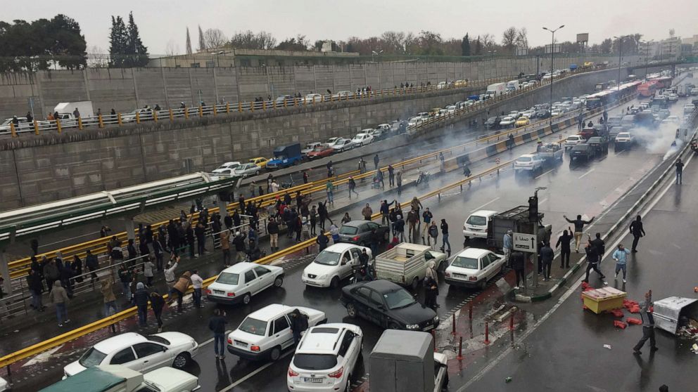 PHOTO: People stop their cars in a highway to show their protest for increased gas price in Tehran, Iran November 16, 2019.
