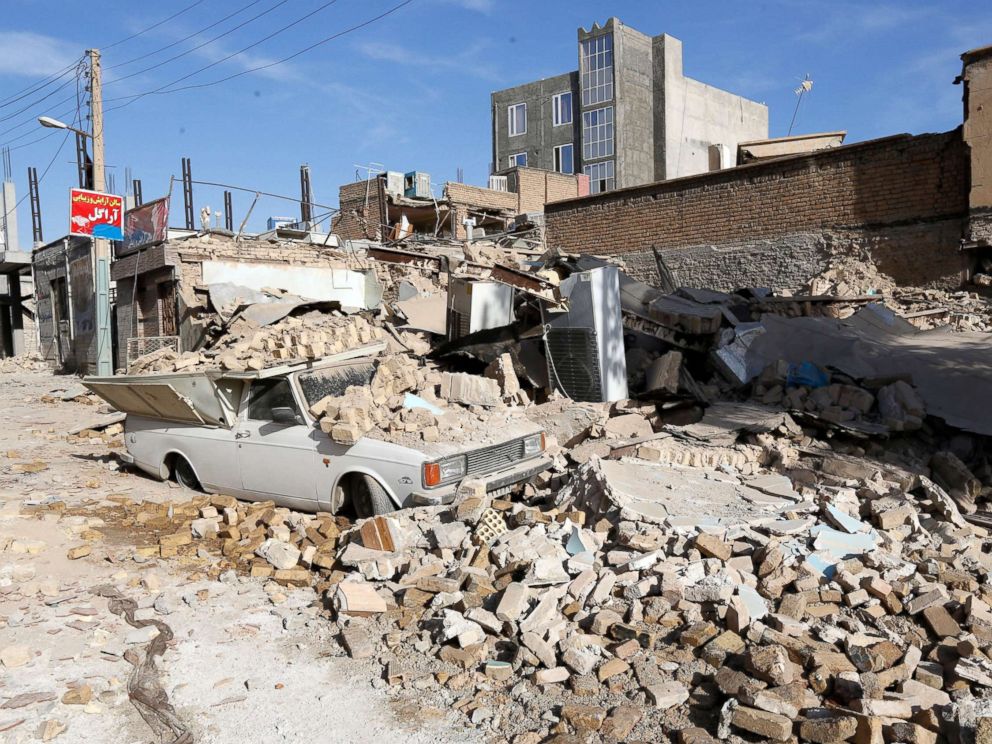 PHOTO: A car trapped under wreckage after an earthquake in the city of Pole-Zahab, in Kermanshah Province, Iran, Nov. 13, 2017.