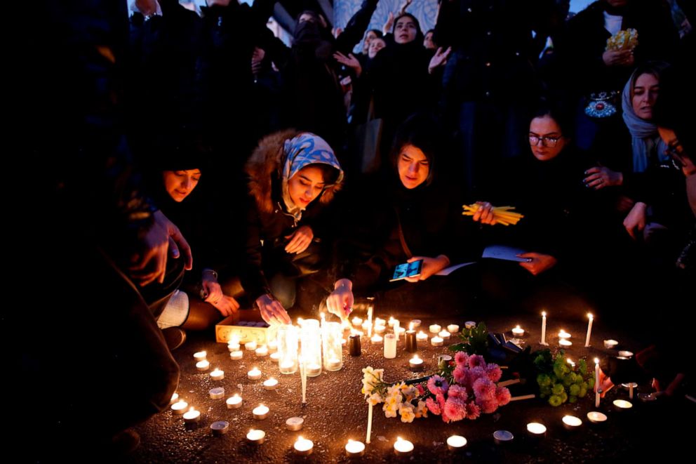 PHOTO: Iranians light candles for the victims of Ukraine International Airlines Boeing 737 during a gathering in front of the Amirkabir University in the capital Tehran, Iran, Jan. 11, 2020.